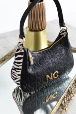 Góndola Noco animal print negra - Imagen 2